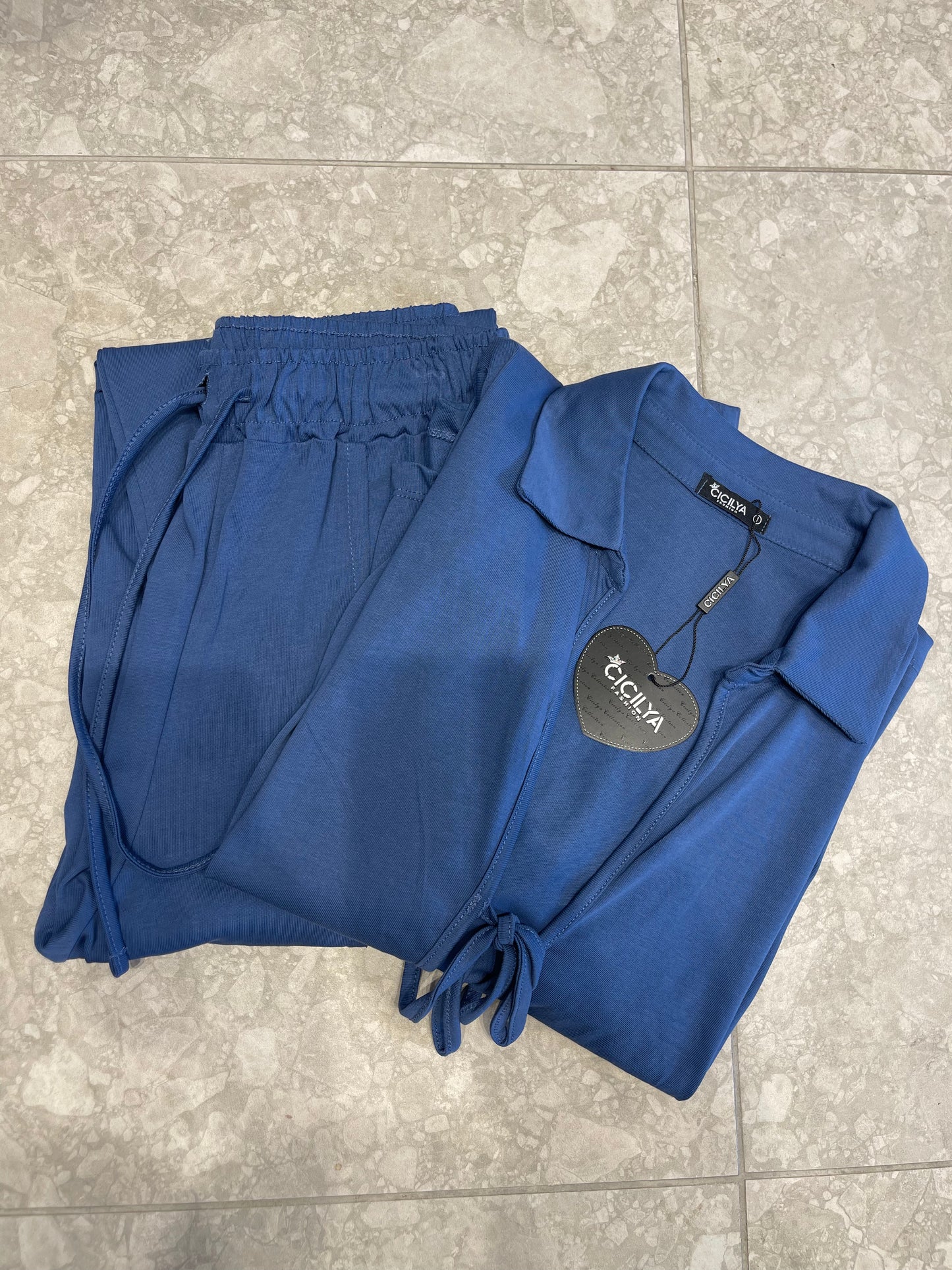 חליפת רוגבי קשירות מכנסיים מתרחבים