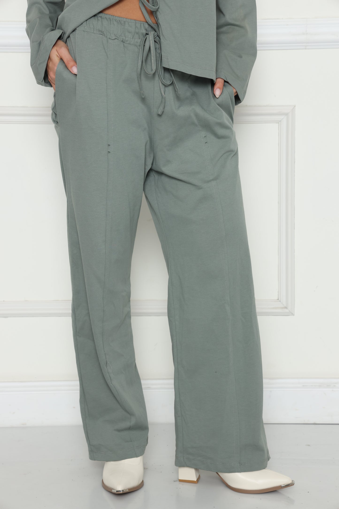 חליפת רוגבי קשירות מכנסיים מתרחבים