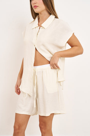 חליפת שורט קרפ מכופתרת