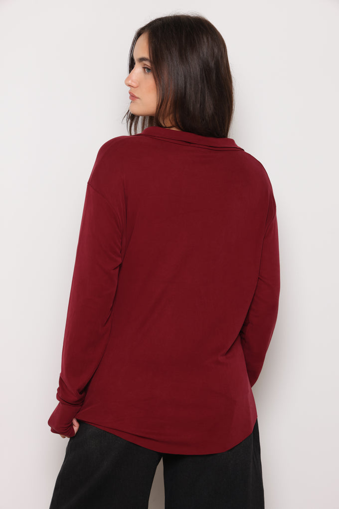 חולצת קופרו מכופתרת כפפה